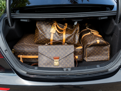 First Class Cars' Mercedes E-Class boot holding Louis Vuitton luggage (E2FCC)